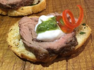 House Dry Rubbed Beef Tenderloin Crostini Topped with Horseradish Sauce
