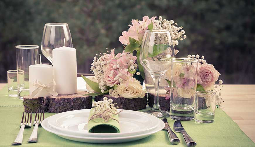 Table with flowers and cutlery