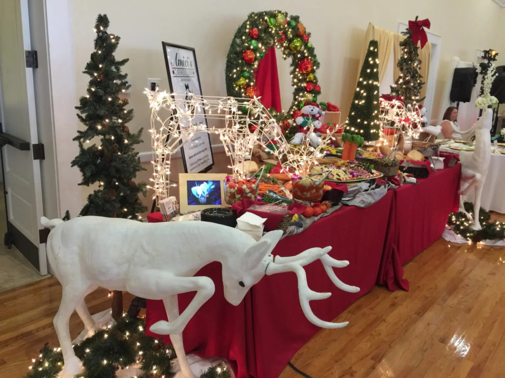 Catering Christmas buffet decorated with holiday decor at a holiday party